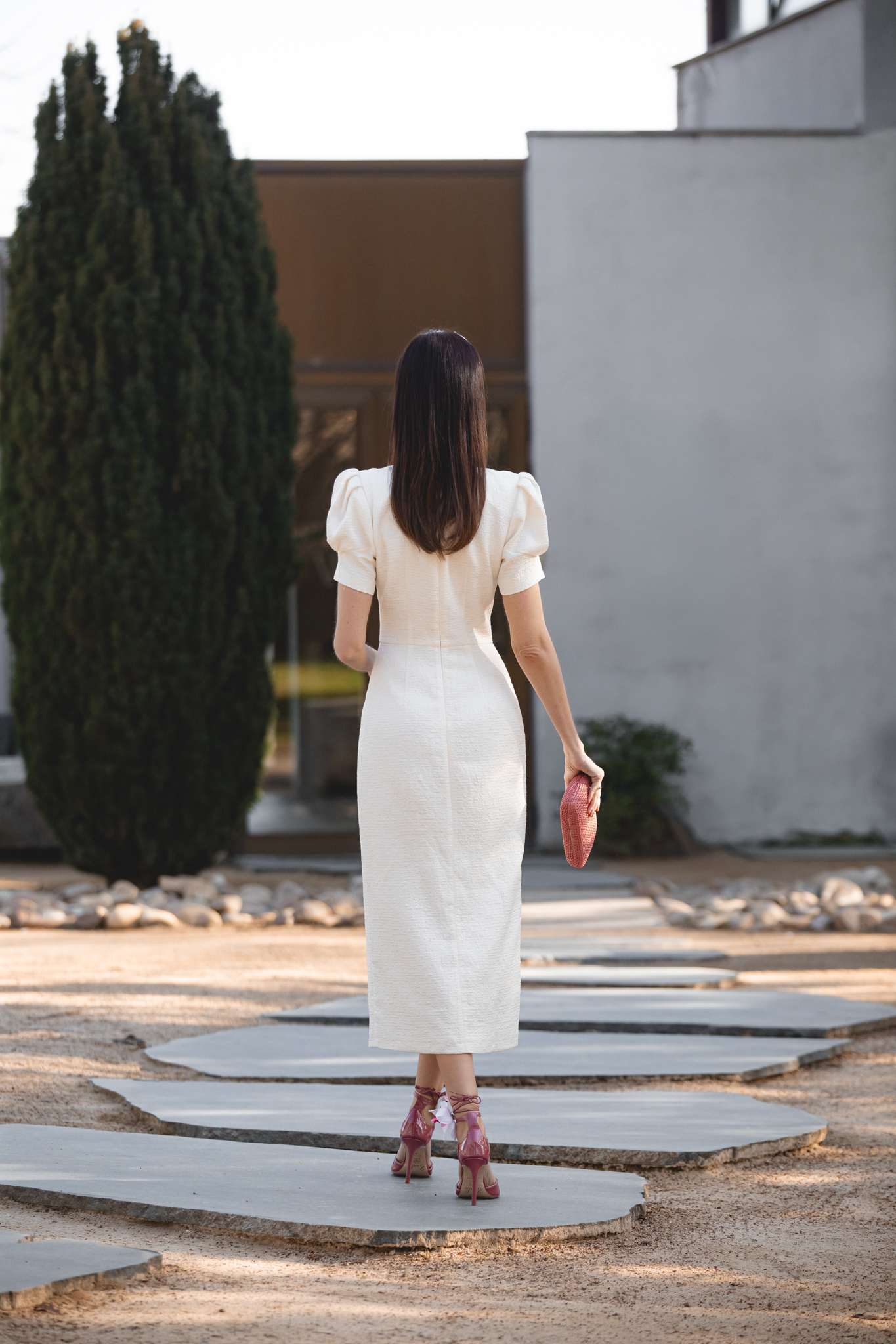 Espalda look de comunión vestido blanco